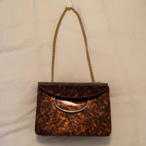 Tortoise chain shoulder purse